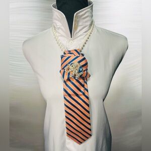 Orange and Blue Striped Necktie with Elephant Brooch